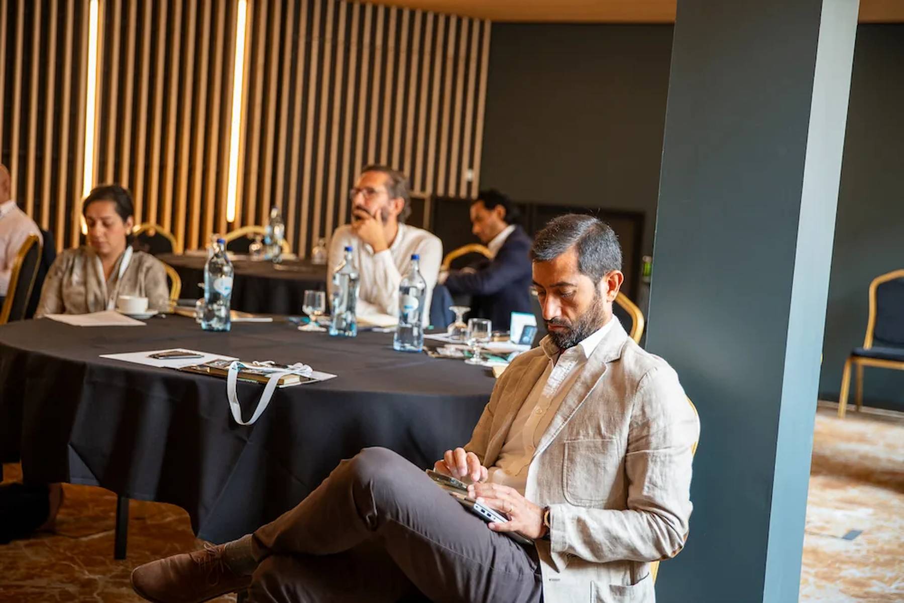 Conference participant checking the networking app