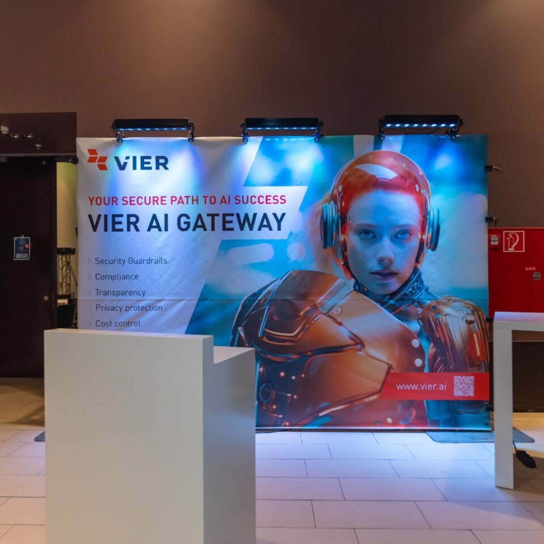 A large banner for "VIER AI GATEWAY: Your Secure Path to AI Success" featuring an image of a person with a futuristic red helmet.